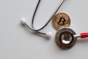 https://www.pexels.com/photo/stethoscope-and-bitcoin-on-white-surface-5435970/